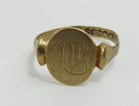 A child's 9ct gold signet ring, finger size G 1/2,