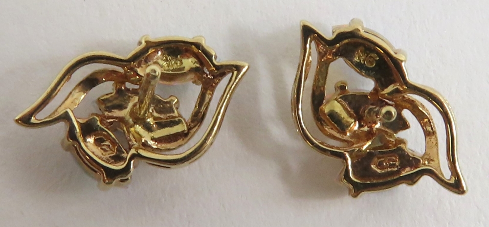 A pair of 9ct gold opal set stud earrings, the thr - Image 5 of 6