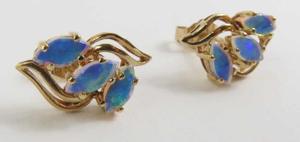 A pair of 9ct gold opal set stud earrings, the thr - Image 3 of 6