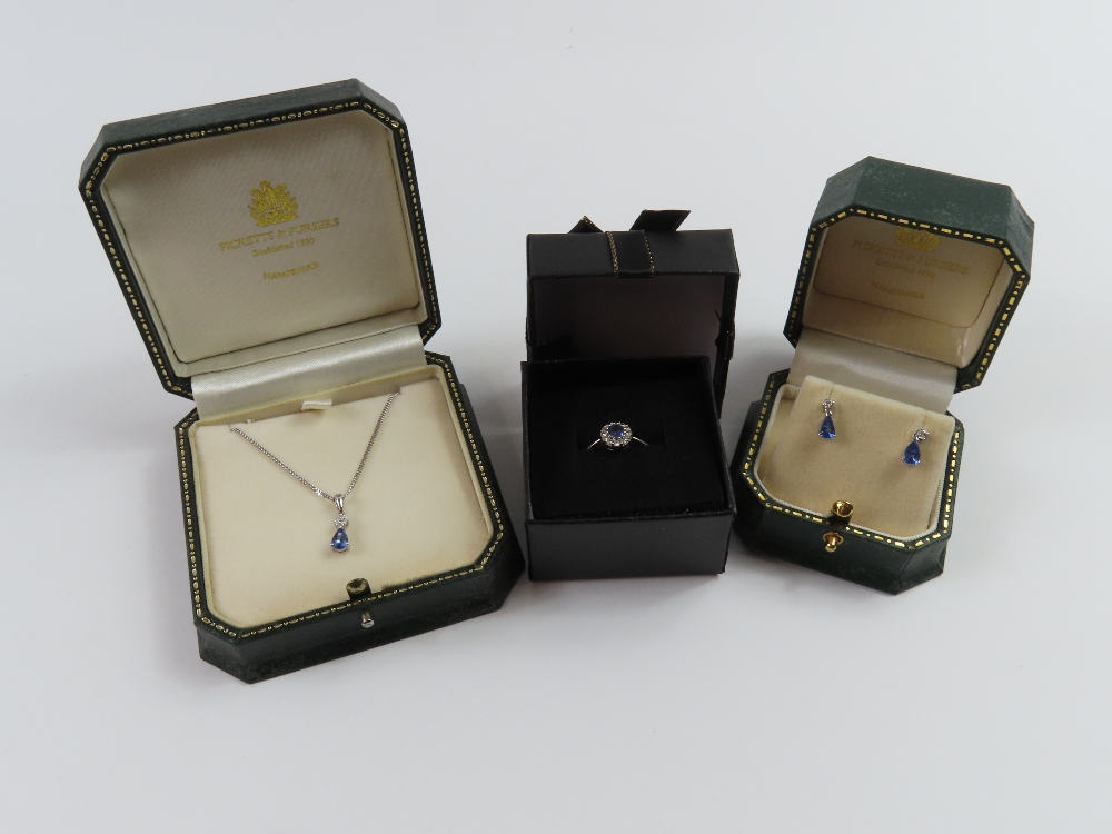 A suite of white gold tanzanite jewellery comprisi