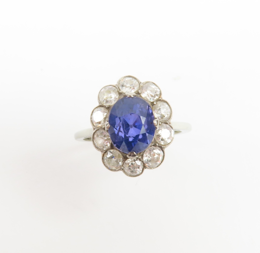 An early 20th century violet colour change sapphire and diamond cl - Image 2 of 17