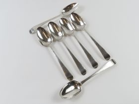 Six Georgian silver serving spoons, made by James