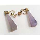 A pair of lilac hardstone drop earrings, the taper