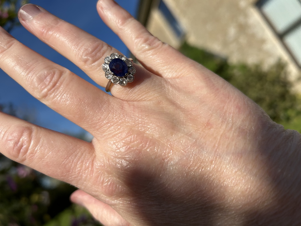 An early 20th century violet colour change sapphire and diamond cl - Image 13 of 17