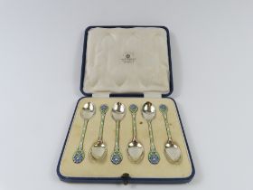 A case of six silver spoons, made by Mappin & Webb
