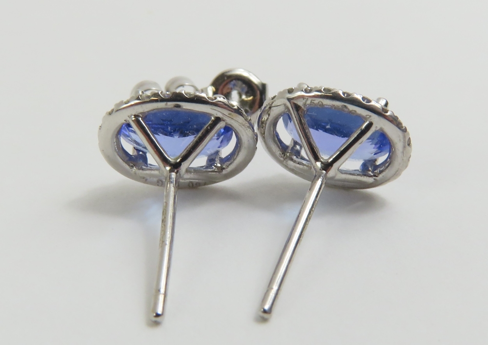 A pair of 18ct white gold tanzanite and diamond cl - Image 3 of 4