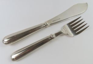 A silver-plate serving fish knife and fork, made b
