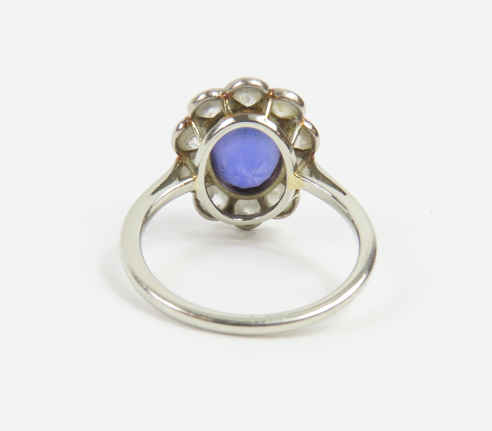 An early 20th century violet colour change sapphire and diamond cl - Image 6 of 17