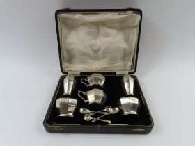 A matched and cased six-piece silver cruet set, ma