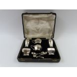 A matched and cased six-piece silver cruet set, ma