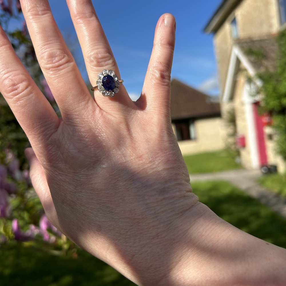 An early 20th century violet colour change sapphire and diamond cl - Image 11 of 17