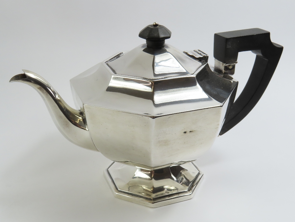 A three piece silver tea set, PFM, Sheffield, 1912 - Image 8 of 10