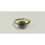 An early 20th century sapphire and rose cut diamond daisy