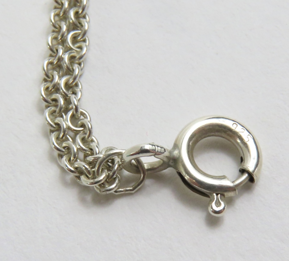 Tiffany & Co - a silver Infinity pendant necklace, - Image 9 of 12