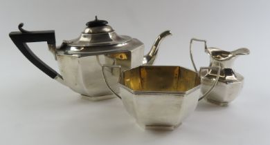 A three piece silver tea set by Charles S Green &