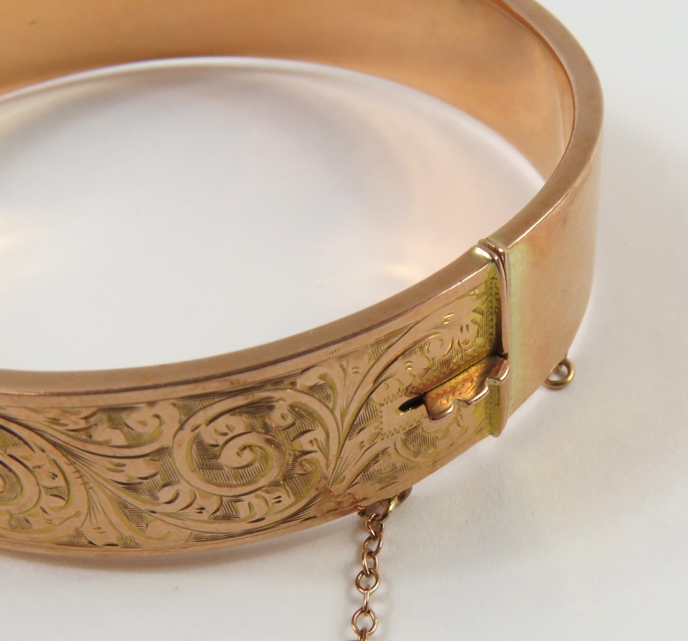 A rose gold half engraved, hollow, hinged bangle, 6cm inte - Image 5 of 5