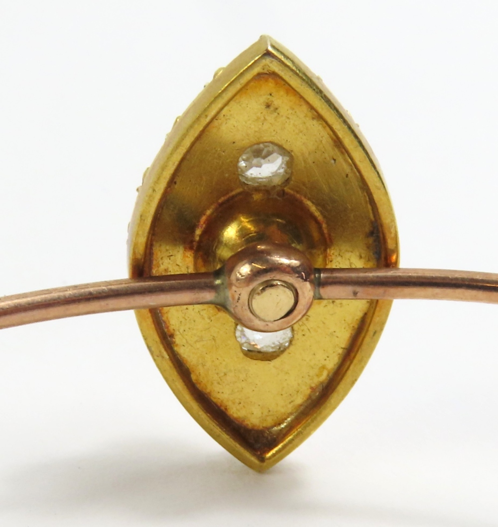 A Victorian bangle, the navette shaped head with a - Image 3 of 5