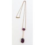 An Edwardian necklet, with two garnet stones in a