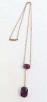 An Edwardian necklet, with two garnet stones in a