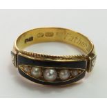 A black enamel and split pearl mourning ring, the