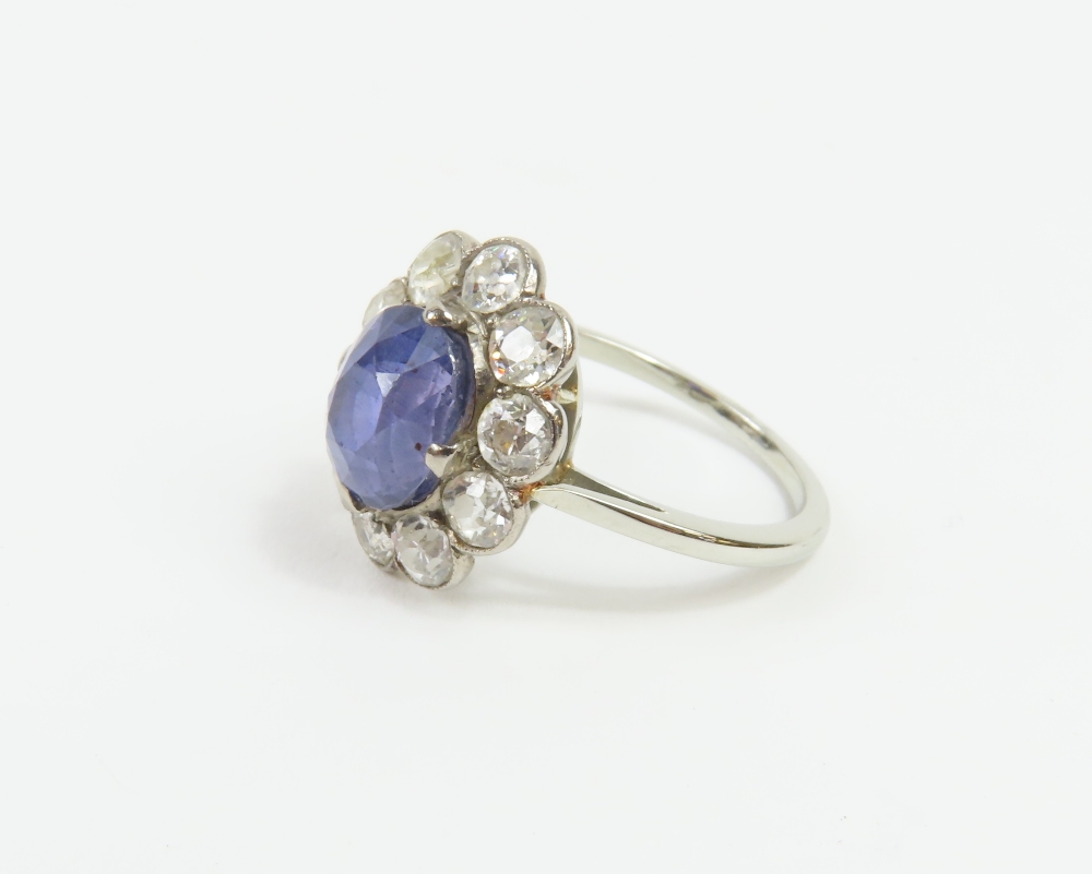 An early 20th century violet colour change sapphire and diamond cl - Image 3 of 17