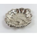 A silver cabbage-leaf dish, made by Barker Ellis S