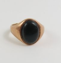 A 9ct rose gold signet ring, set with an oval cut