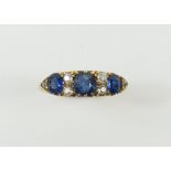 A Victorian carved head sapphire and diamond ring,