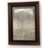 A framed sterling silver slate with printed map of