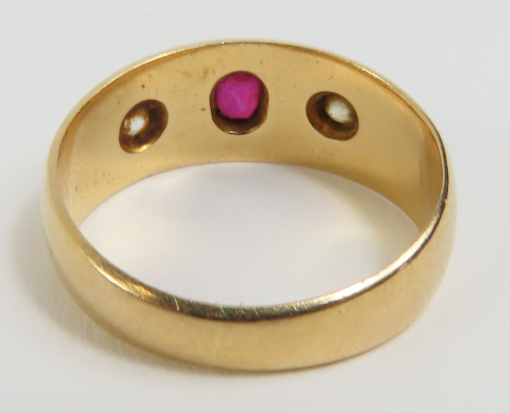 A Victorian gypsy ring, star set with a ruby and t - Image 2 of 4