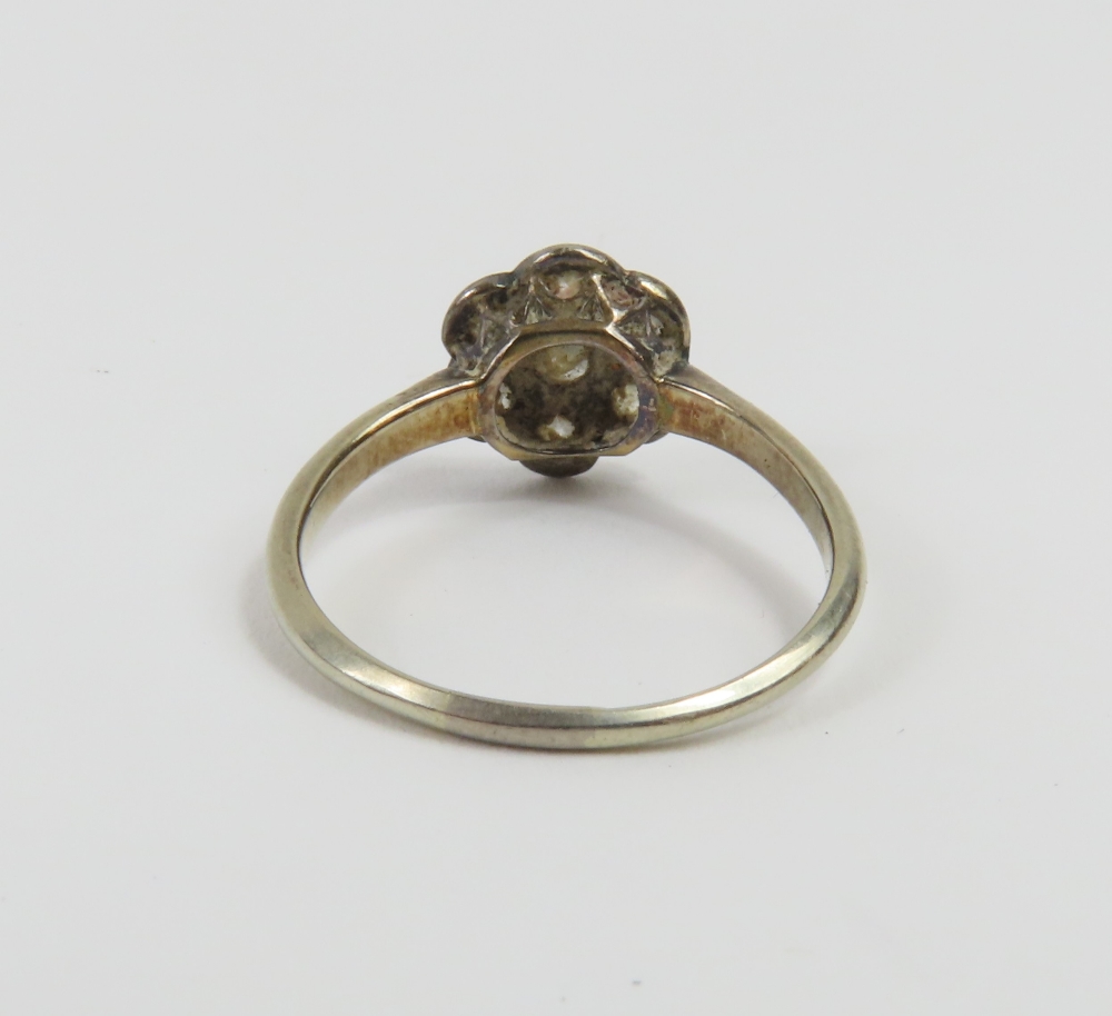 An Edwardian old cut diamond daisy cluster ring, t - Image 4 of 7