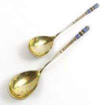 Two Russian silver spoons, marked “A.P 1888” and m