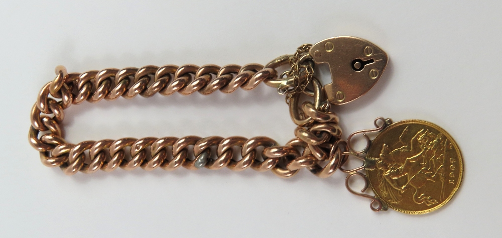 A rose gold hollow curb link bracelet with a 9ct r