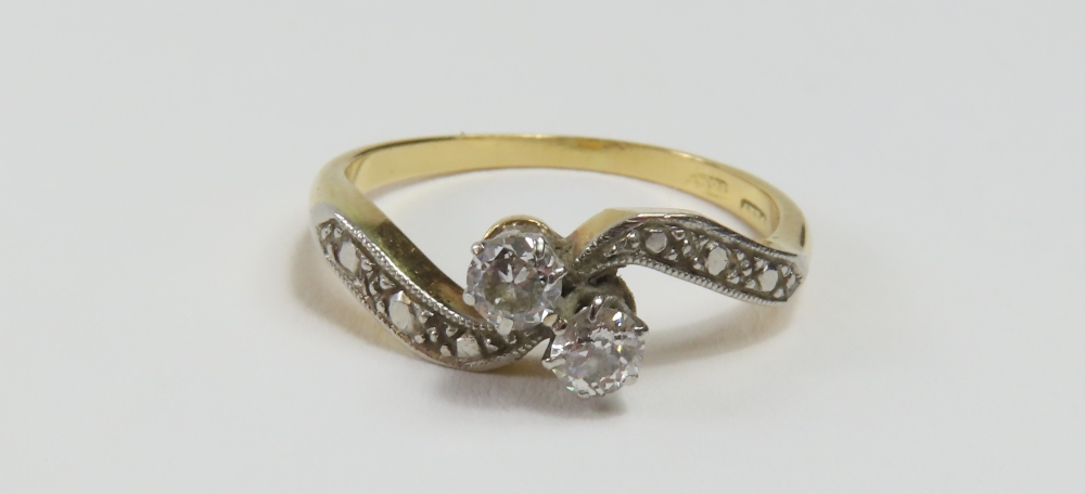 An early to mid-20th century old cut diamond two s
