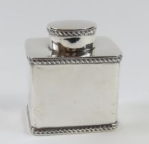 A silver canteen with oval lid, made by Asprey and