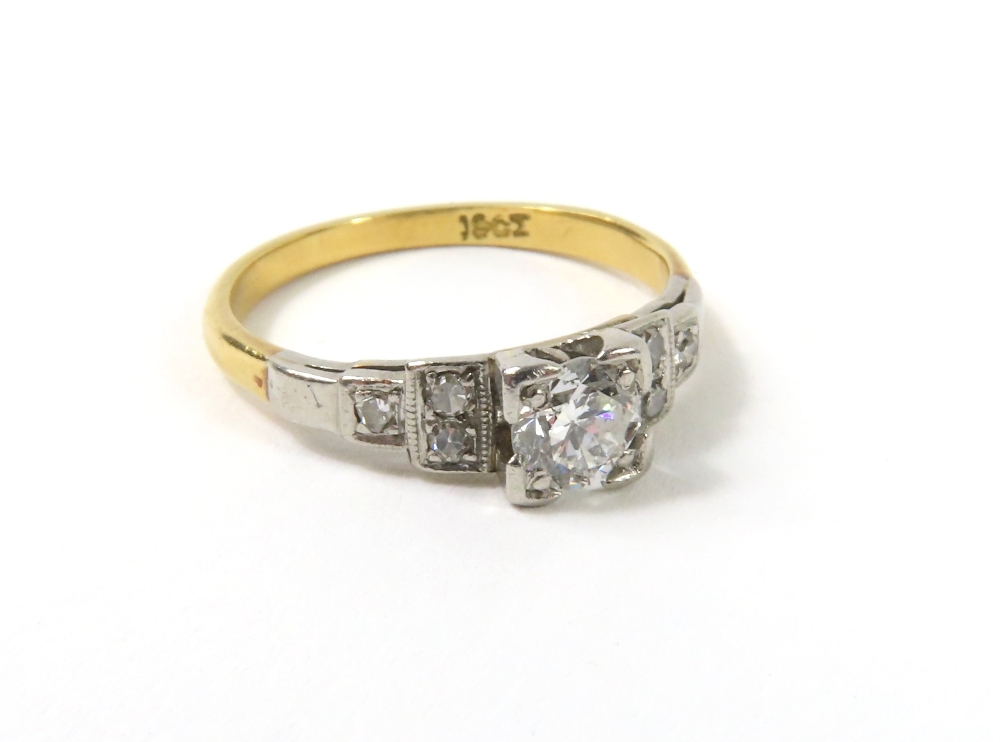 A mid-20th century round brilliant cut diamond sol