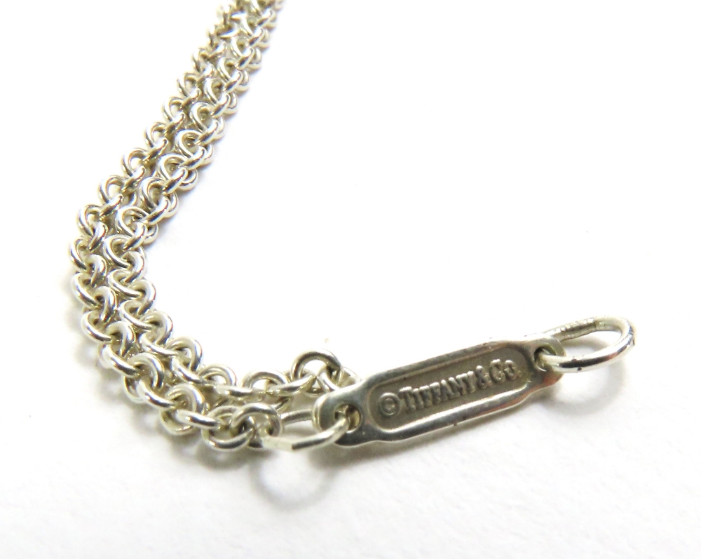 Tiffany & Co - a silver Infinity pendant necklace, - Image 5 of 12