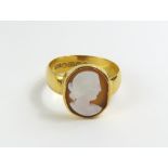 A Victorian 22ct gold ring set with a shell cameo