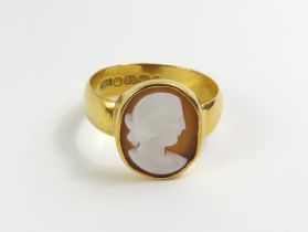 A Victorian 22ct gold ring set with a shell cameo