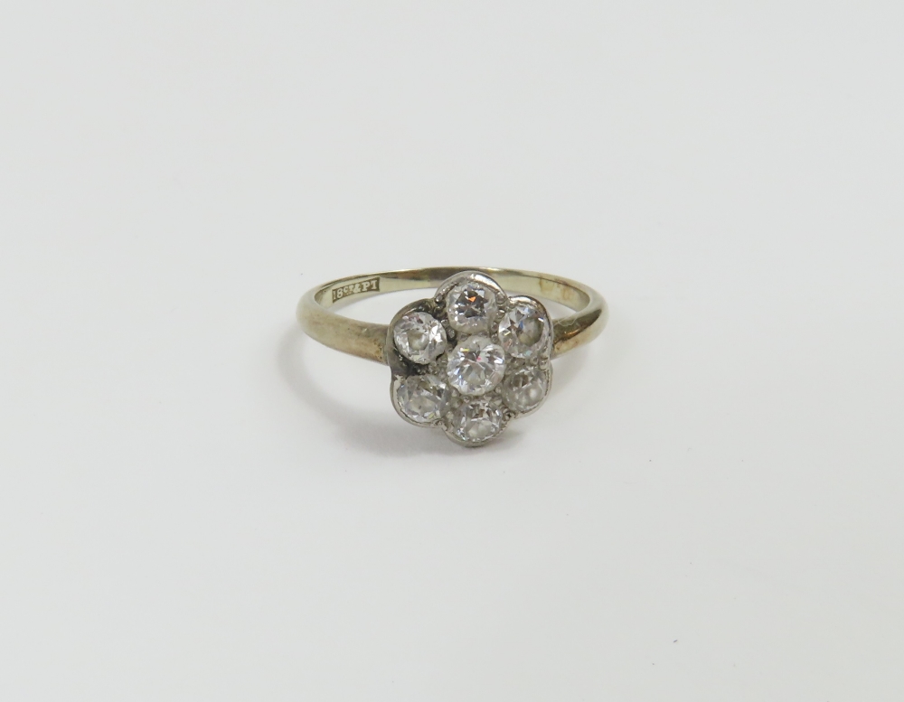 An Edwardian old cut diamond daisy cluster ring, t