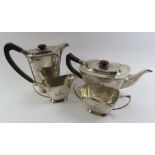 A silver four piece tea set, by Charles S Green &