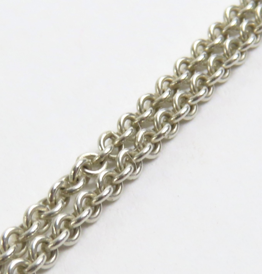 Tiffany & Co - a silver Infinity pendant necklace, - Image 10 of 12