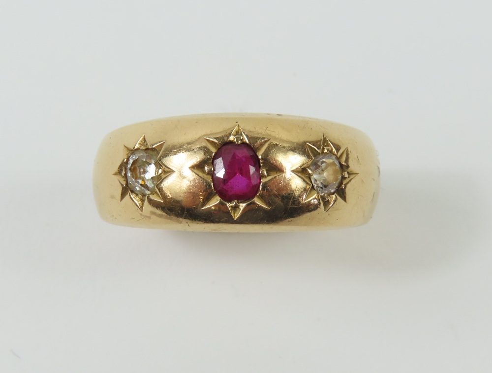 A Victorian gypsy ring, star set with a ruby and t