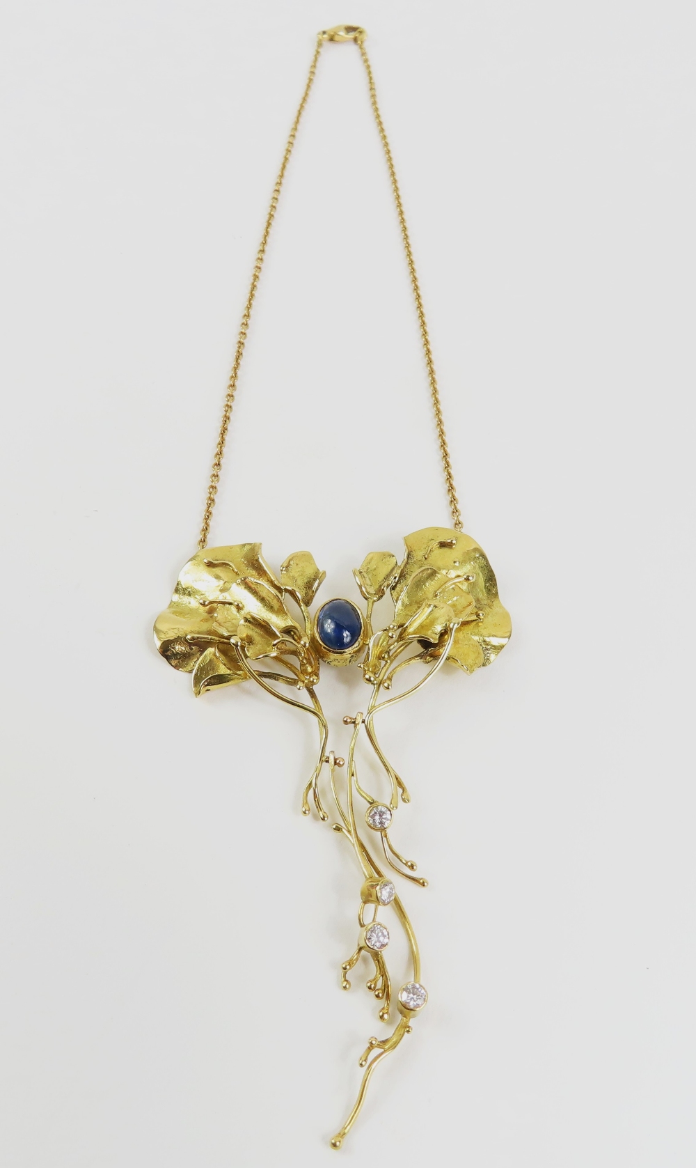 An 18ct gold sapphire and diamond necklace in the