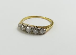 An early 20th century graduated five stone diamond