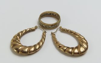 A pair of 9ct gold twisted hoop earrings, and a sy