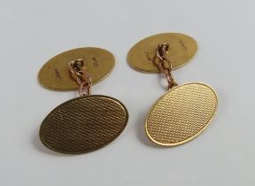 A pair of 9ct gold cufflinks, composed of two oval