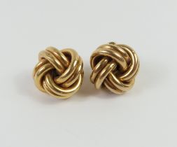 A pair of large 9ct gold polished stud earrings, a