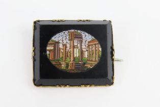 A Victorian micro mosaic brooch depicting the Roma