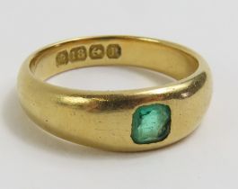 An 18ct gold gypsy style ring, set with a single s